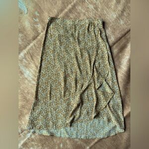 Very pretty faux wrap style skirt.